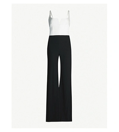 Shop Galvan Eclipse Satin And Crepe Jumpsuit In Black White