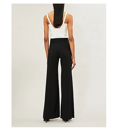 Shop Galvan Eclipse Satin And Crepe Jumpsuit In Black White