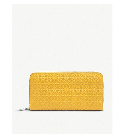 Shop Loewe Anagram Embossed Logo Leather Wallet In Yellow Mango