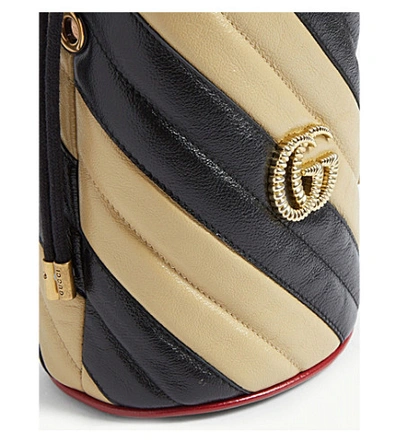 Shop Gucci Gg Marmont Mini Leather Bucket Bag In Black Diagonal Beige