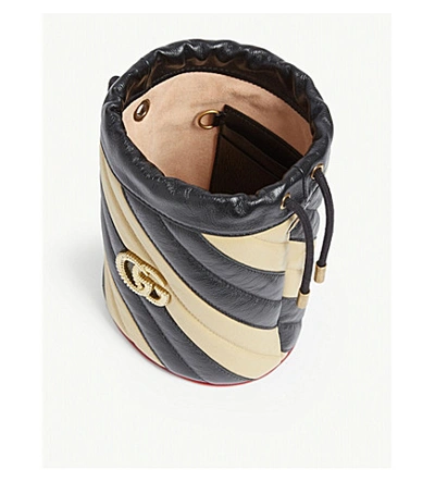 Shop Gucci Gg Marmont Mini Leather Bucket Bag In Black Diagonal Beige