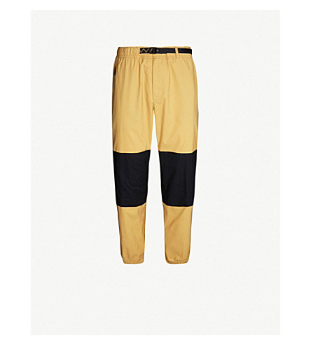 Nike Acg Trail Logo-embroidered Woven Jogging Bottoms In Club  Gold/black/black | ModeSens