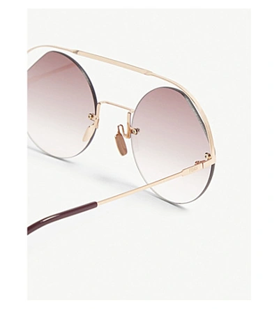 Shop Fendi Ff0325/s Round-frame Sunglasses In Gold
