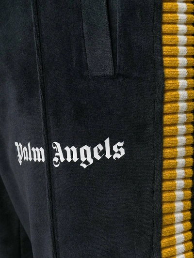 Shop Palm Angels Velvet Track Pants Black