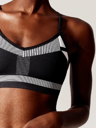 Shop Nike Flyknit Indy Bra In Black/pure Platinum