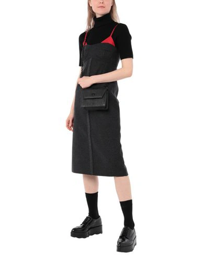 Shop Cruciani Cross-body Bags In Black