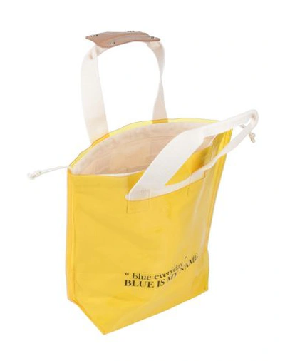 Shop Sjyp Handbags In Yellow