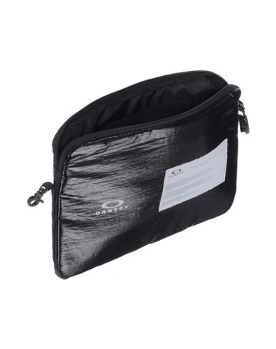 Shop Oakley Cross-body Bags In Black