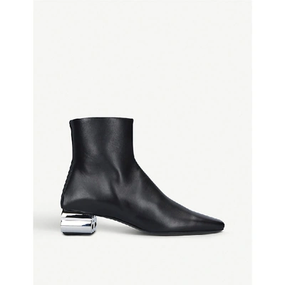 Shop Balenciaga Typo Leather Heeled Ankle Boots In Blk/other