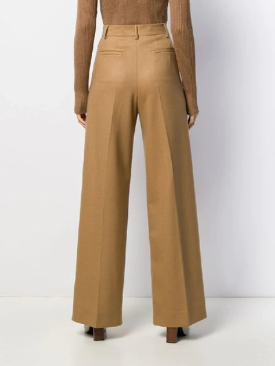 Shop Fendi High-waist Flared Trousers In Brown