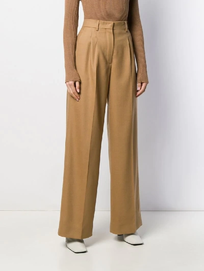 Shop Fendi High-waist Flared Trousers In Brown