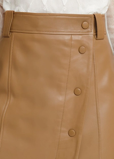 Shop Ganni Leather Wrap Skirt In Tiger's Eye