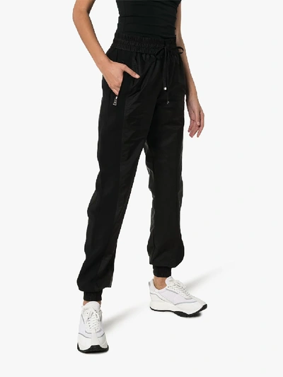 Shop Moncler Panelled Track Pants In Black