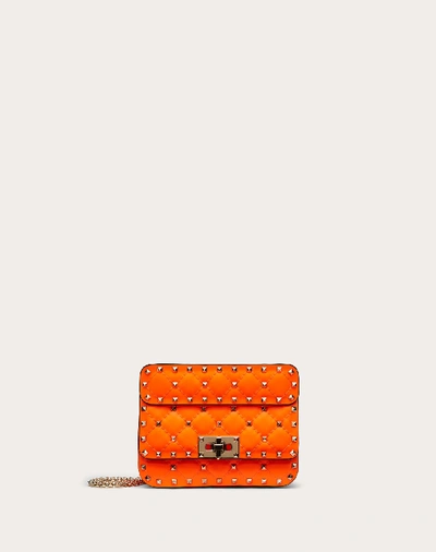 Shop Valentino Garavani Mini Rockstud Spike Fluo Calfskin Leather Bag In Florescent Orange