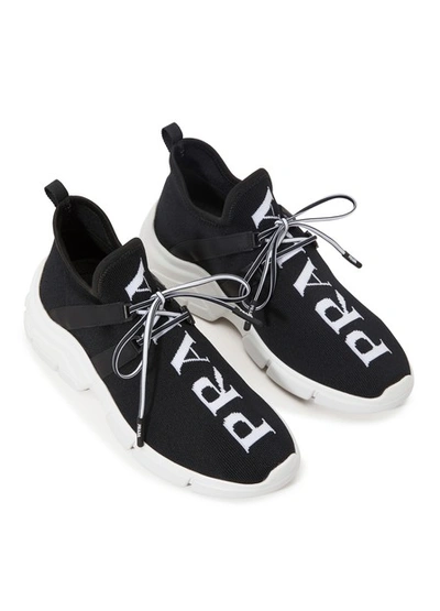 Shop Prada Trainers In Black / White