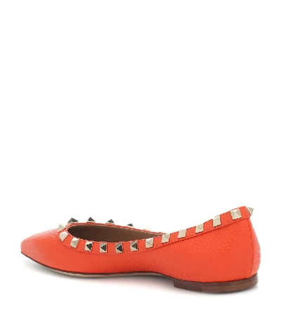 Shop Valentino Garavani Rockstud Leather Ballet Flats In Orange