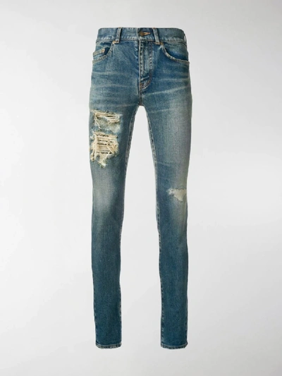 Shop Saint Laurent Ripped-detail Skinny Jeans In Blue