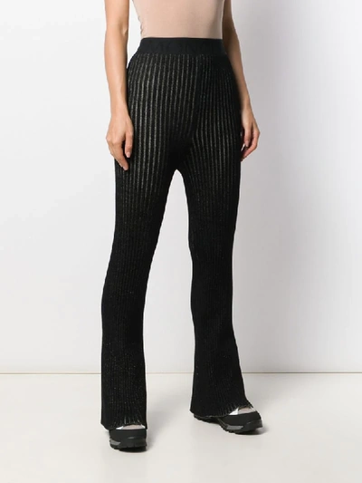Shop Moncler Metallic Threading Knitted Trousers In Black