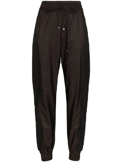 Shop Moncler Panelled Shell Track Pants In Black