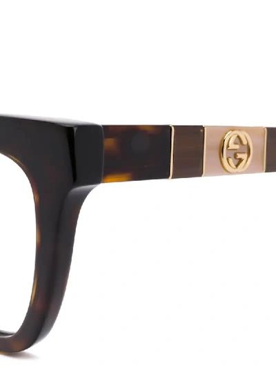 Shop Gucci Tortoiseshell Rectangular-frame Glasses In Brown