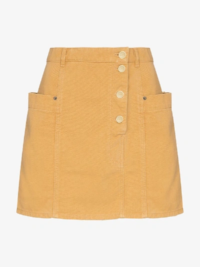 Shop Jacquemus La Jupe De Nimes Denim Mini Skirt In Yellow