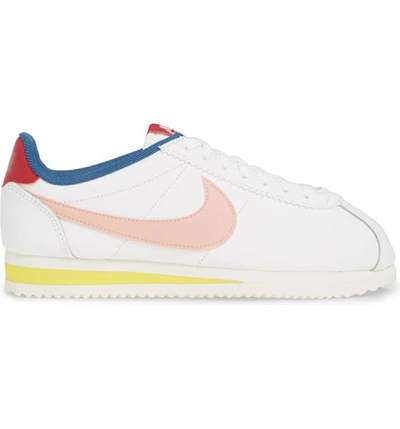 Shop Nike Classic Cortez Sneaker In White/ Coral Stardust/ Gym Red