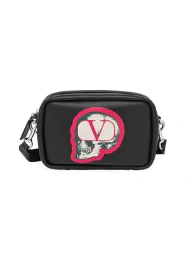 Shop Valentino Garavani Skull Crossbody Bag In Black