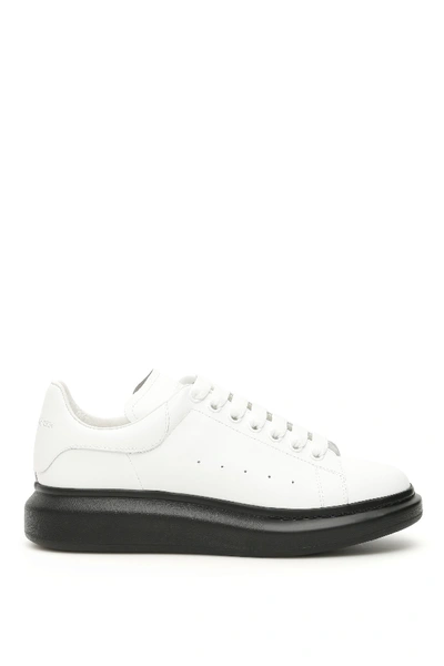 Shop Alexander Mcqueen Oversized Contrast Sole Sneakers In White