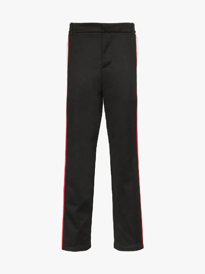 Shop Burberry Sports Stripe Trousers In Black