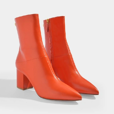 Shop Valentino Ringstud Mid-heeled Ankle Boots In Orange Leather