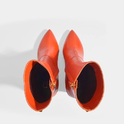Shop Valentino Ringstud Mid-heeled Ankle Boots In Orange Leather