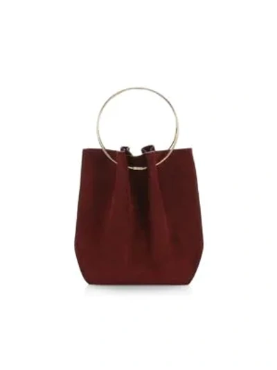 Shop The Row Micro Flat Circle Suede Bucket Bag In Dark Berry