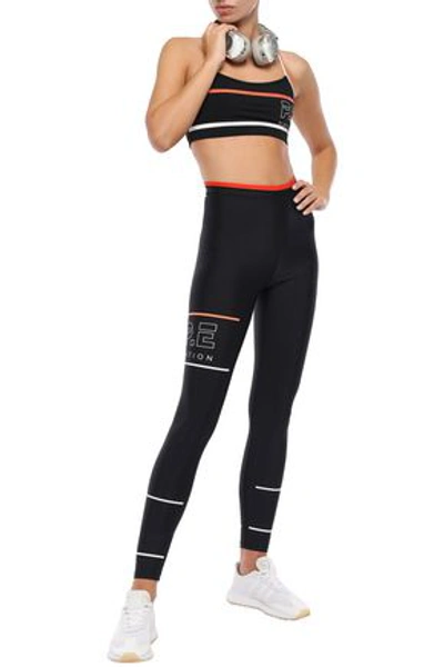 Shop P.e Nation The Chariot Printed Stretch Sports Bra In Black