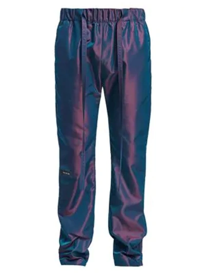 Shop Fear Of God Billowy Nylon Trousers In Blue Iridescent