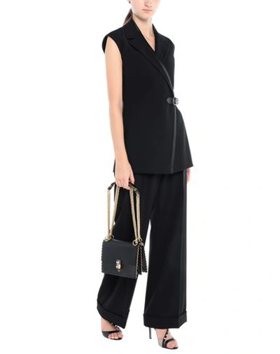 Shop Fendi Cross-body Bags In Black