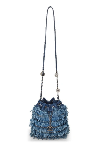 Shop Chanel Blue Fringed Denim Charm Bucket Bag