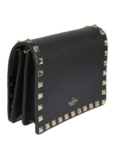 Shop Valentino Pyramid Studded Pouch In Black/gold