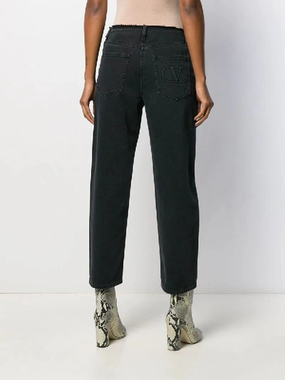 Shop Valentino Embroidered V Jeans