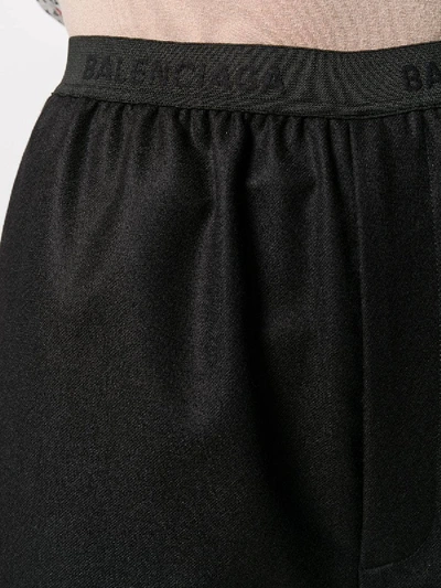 Shop Balenciaga Logo High Waisted Pants In Black
