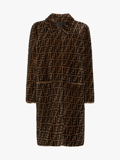 Shop Fendi Ff Print Reversible Leather And Shearling Coat In Brown