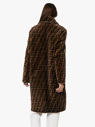 Shop Fendi Ff Print Reversible Leather And Shearling Coat In Brown