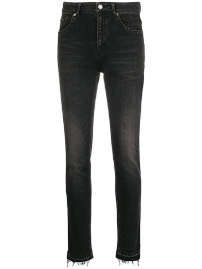 Shop Saint Laurent Cropped Cotton Jeans In Black