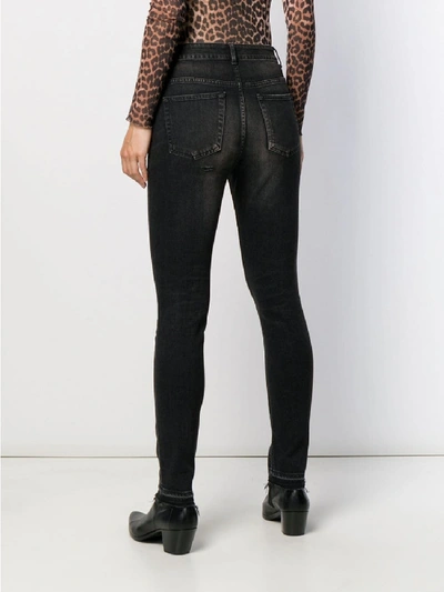 Shop Saint Laurent Cropped Cotton Jeans In Black