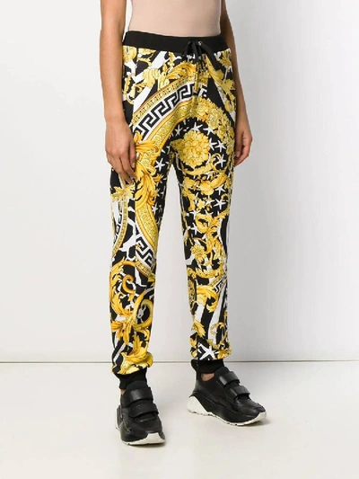 Shop Versace Savage Barocco Print Track Pants