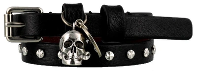 Shop Alexander Mcqueen Wrap Skull Charm Bracelet In Black
