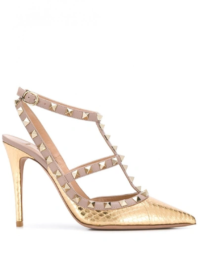 Shop Valentino Rockstud Leather Pumps In Gold