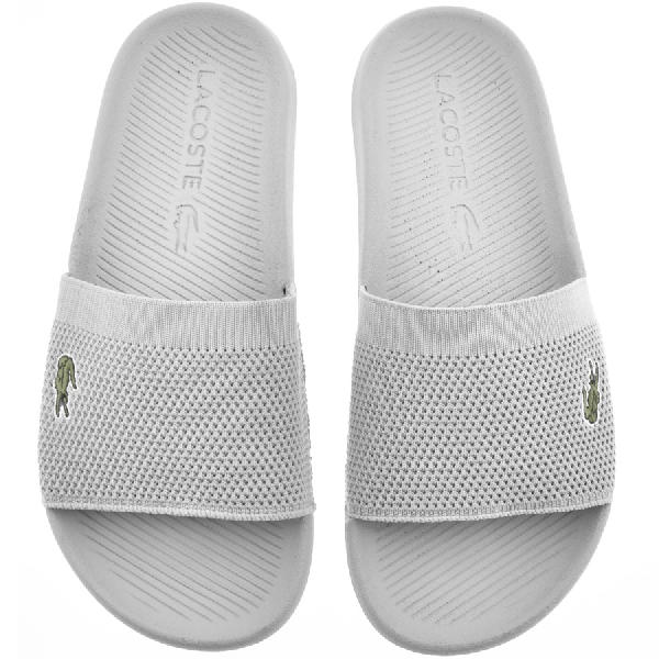 white lacoste sliders