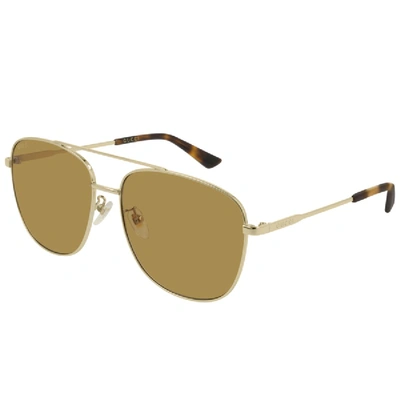 Shop Gucci Gg0410sk 004 Aviator Sunglasses Gold