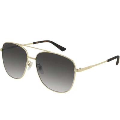 Shop Gucci Gg0410sk 003 Aviator Sunglasses Gold