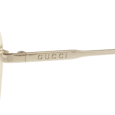 Shop Gucci Gg0410sk 003 Aviator Sunglasses Gold